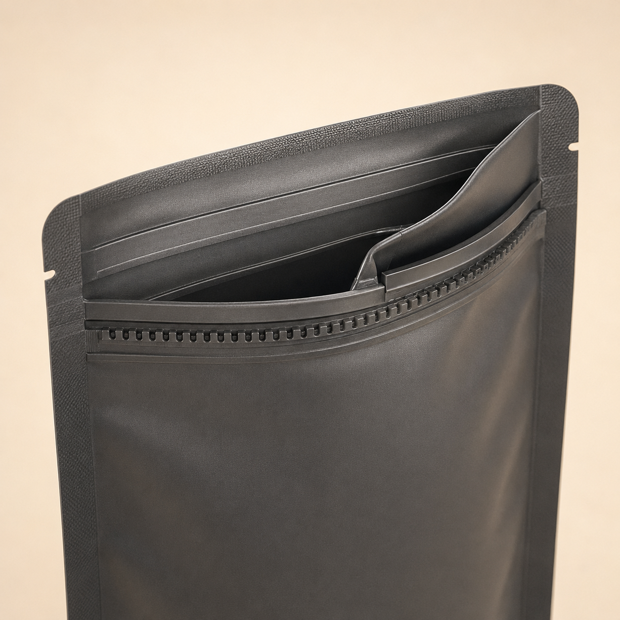 Black Mylar pouch with a concealed child-resistant zipper release.