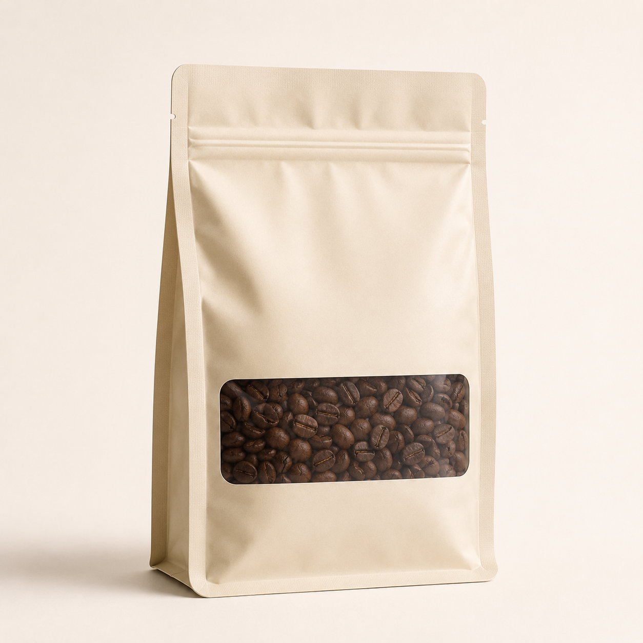 Mylar bag with a transparent window displaying coffee beans inside.