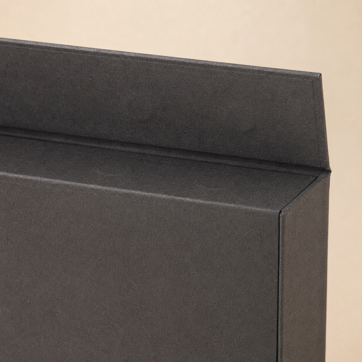 Rigid box with a clean concealed magnetic lid closure.