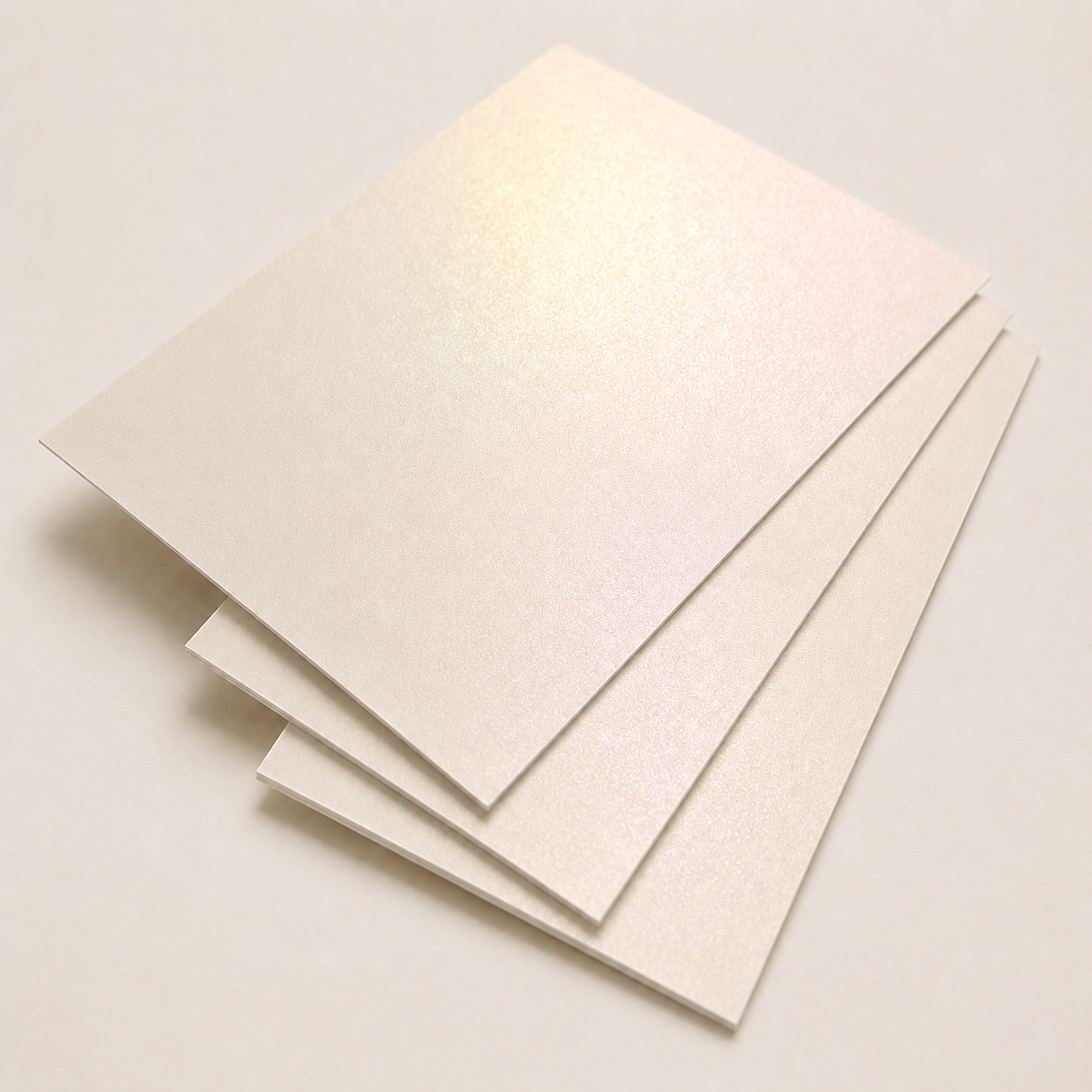 Thin ivory pearlescent cardstock sheets with a soft luminous sheen.
