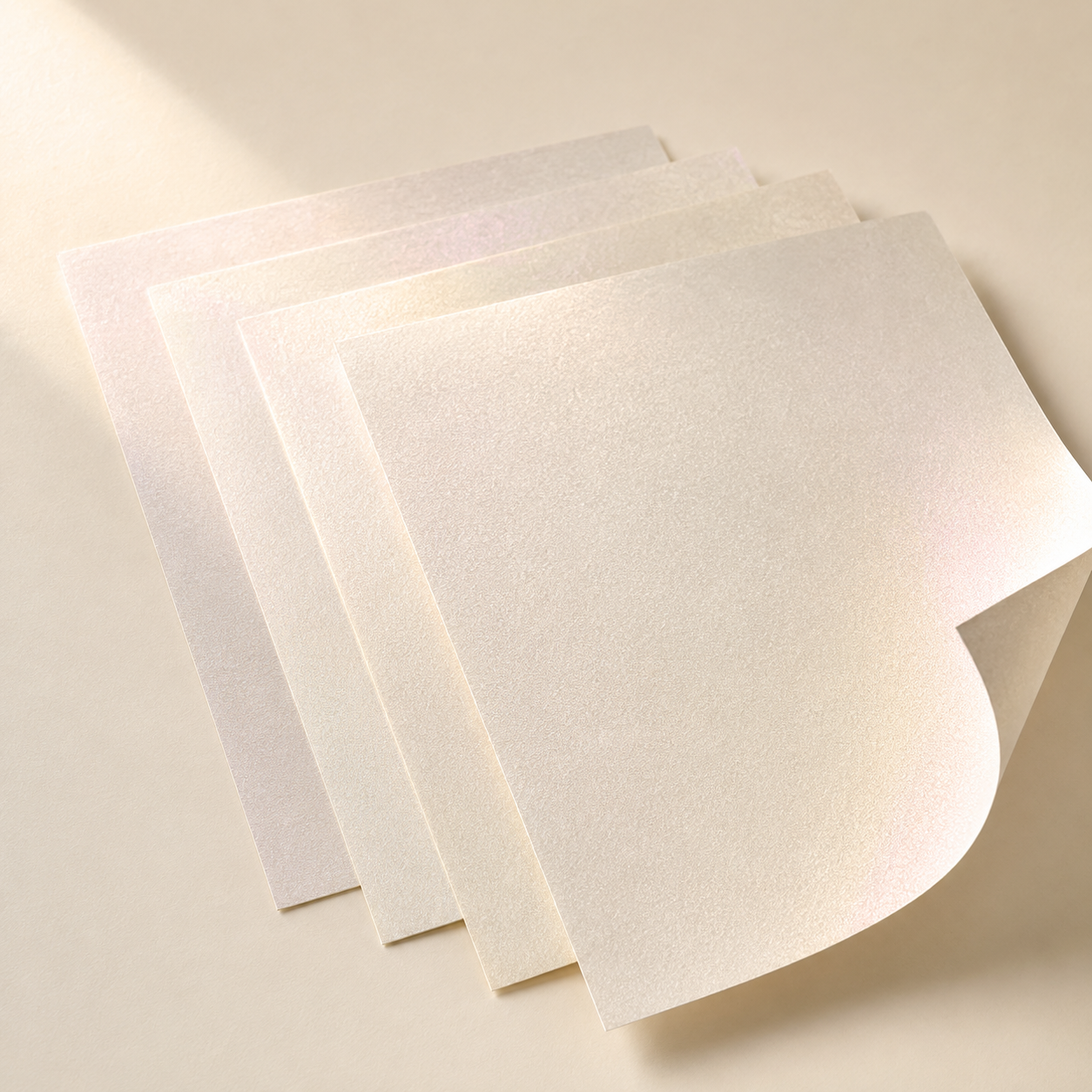 Luminous pearlescent paper sheets for premium rigid box wrapping