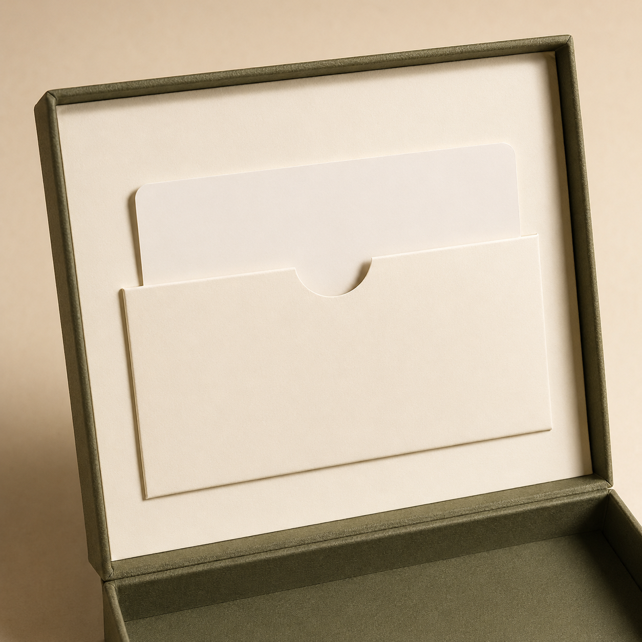 Internal card pocket fitted inside a rigid presentation box lid.