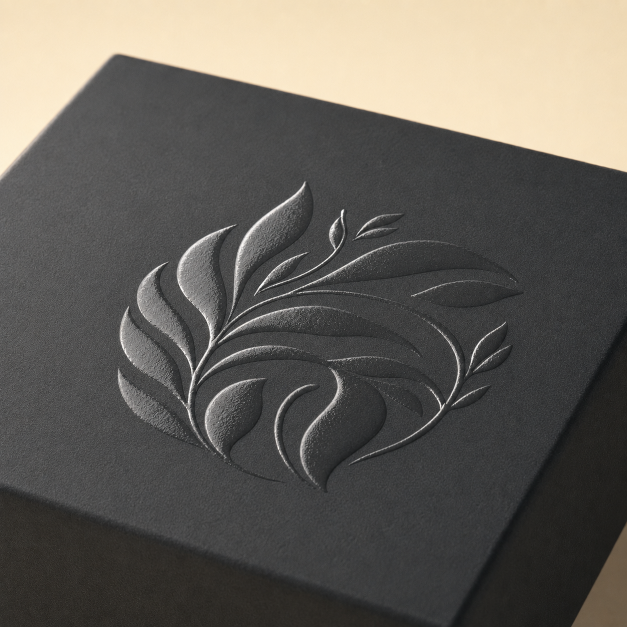 Glossy spot UV design against a matte black packaging surface.