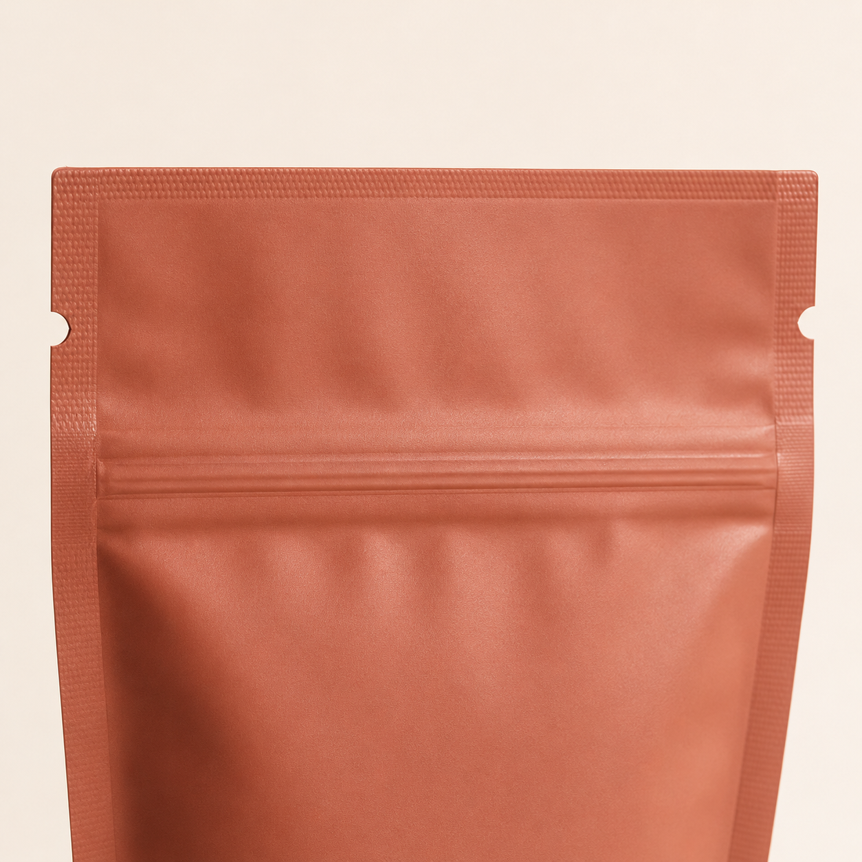 Mylar pouch with side tear notches above the resealable zipper.
