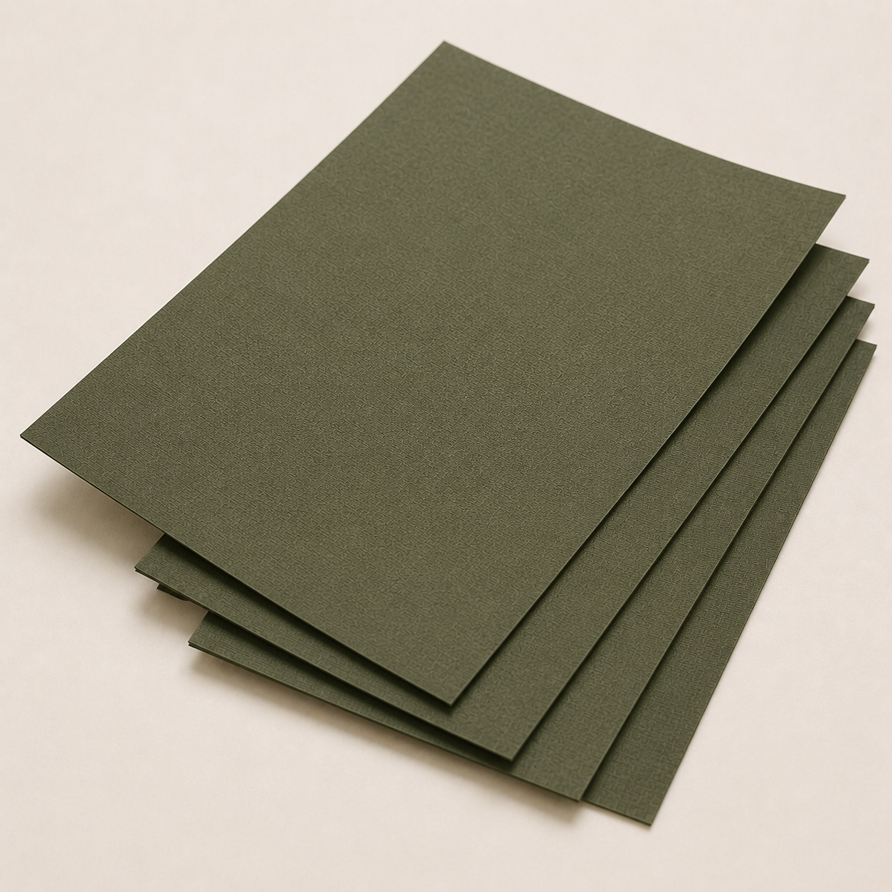 Thin olive textured cardstock sheets with an embossed linen surface.