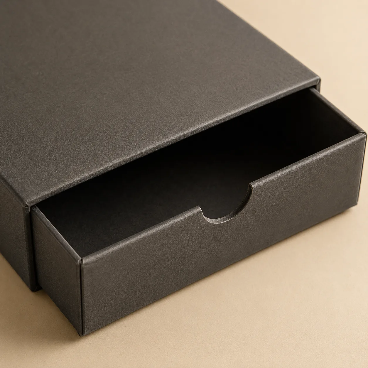 Drawer-style rigid box with a semicircular finger notch.