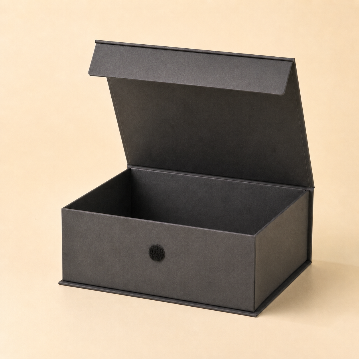 Open rigid box with a Velcro dot closure on the front.