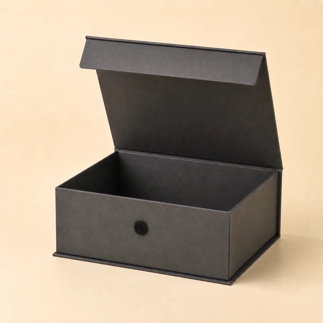 Open rigid box with a hook-and-loop dot closure on the front.