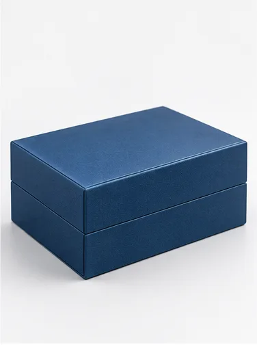 Closed hinged rigid box showing the closure area where a ribbon, friction fit or magnetic closure may be used.