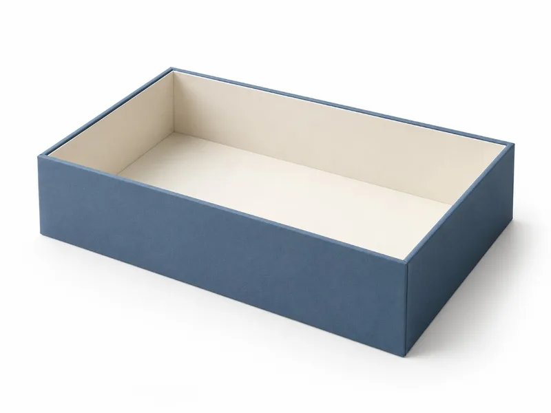 Inner tray of a custom drawer box showing the rigid open-topped compartment that holds the product or fitted insert.