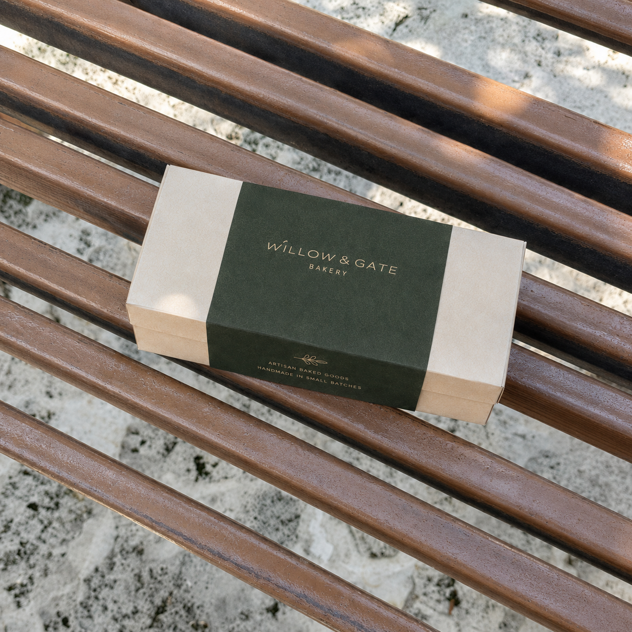 Box sleeve wrapped around a rectangular bakery box, overhead view