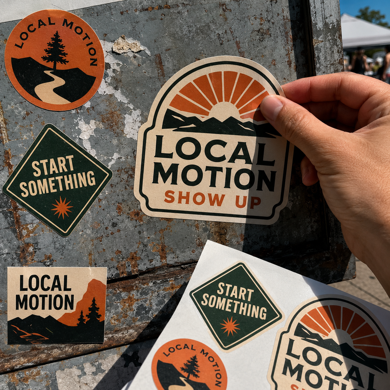 Campaign stickers applied to a weathered metal surface