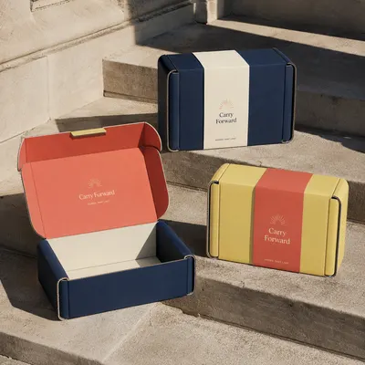Roll end boxes with lid, shown with a separate lid and base in navy, cream, coral, and yellow, one open and empty.