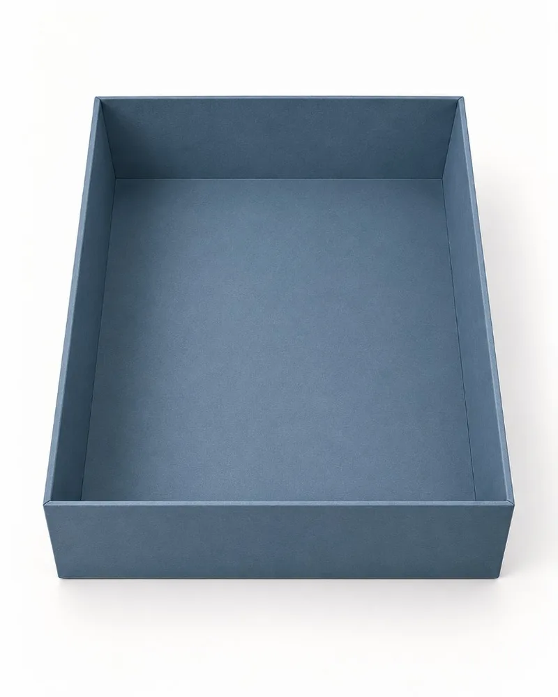 Empty shoulder neck rigid box base showing its floor and four outer walls.